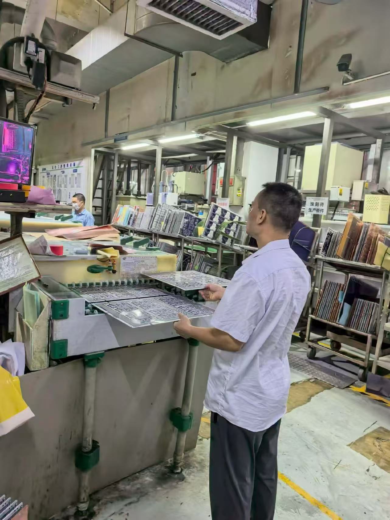 PCB panels being handled on the production floor during manufacturing coordination