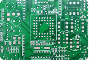 Double-sided PCB with through-hole component pads and signal traces.